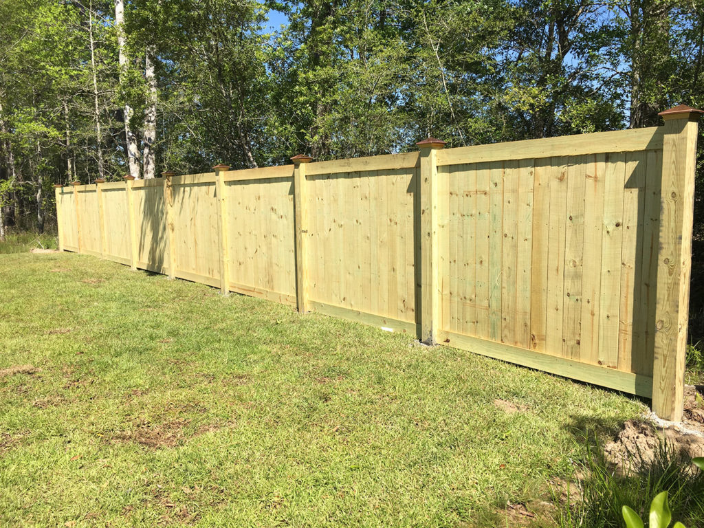 framed fence with copper post caps 2 | A-1 Fence Company